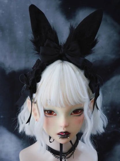 Serre-tête gothique noir avec oreilles de lapin et nœuds