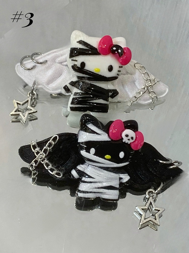 Pinces à cheveux Guro Kawaii Mummy Kitty noires/blanches