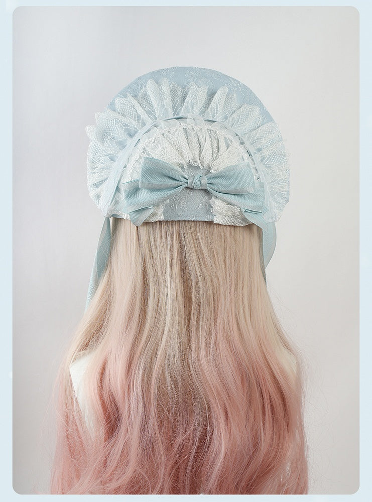 Bonnet Lolita à volants bleus et bordure en dentelle florale