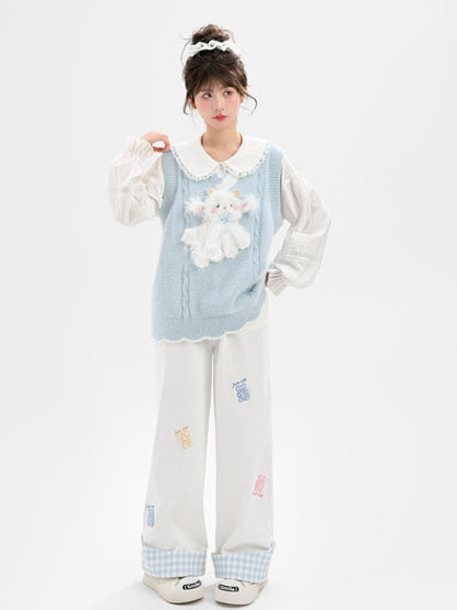 Yume Kawaii Blaue Strickweste mit Plüschlamm vorne