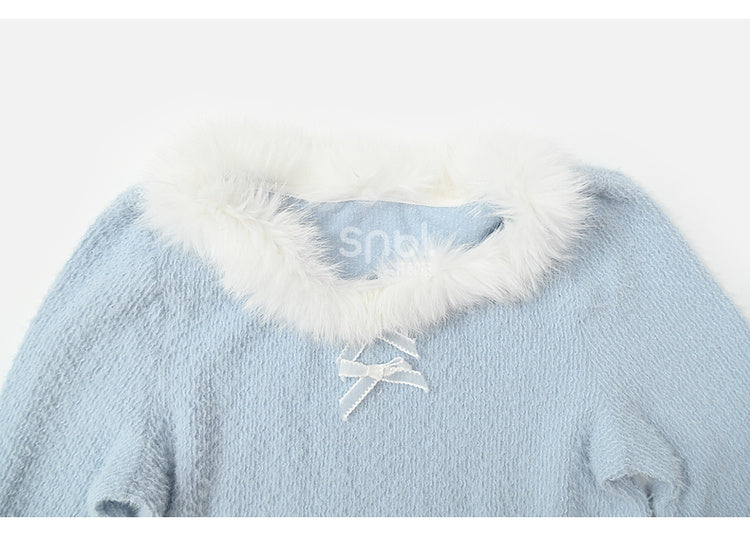 Haut à manches longues et col en peluche bleu avec détails nœud