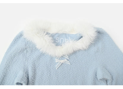Haut à manches longues et col en peluche bleu avec détails nœud