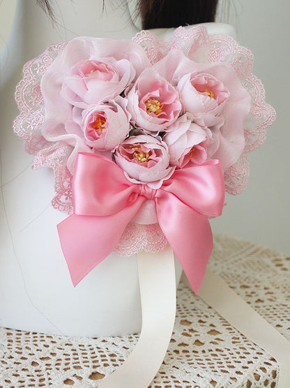 Barrette à cheveux avec nœud floral rose et bordure en dentelle