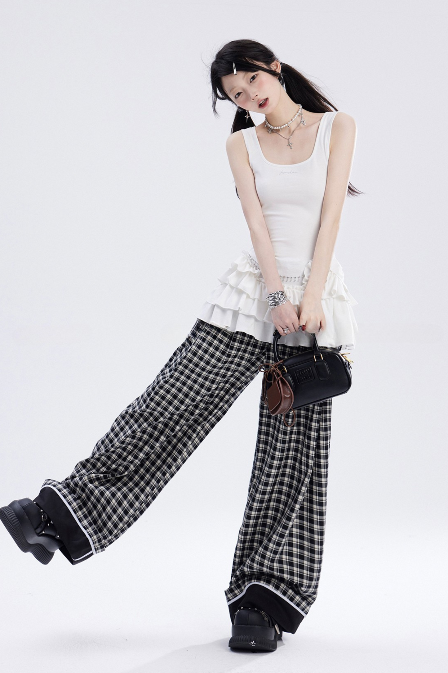 Leg Check and Black Pants White Wide