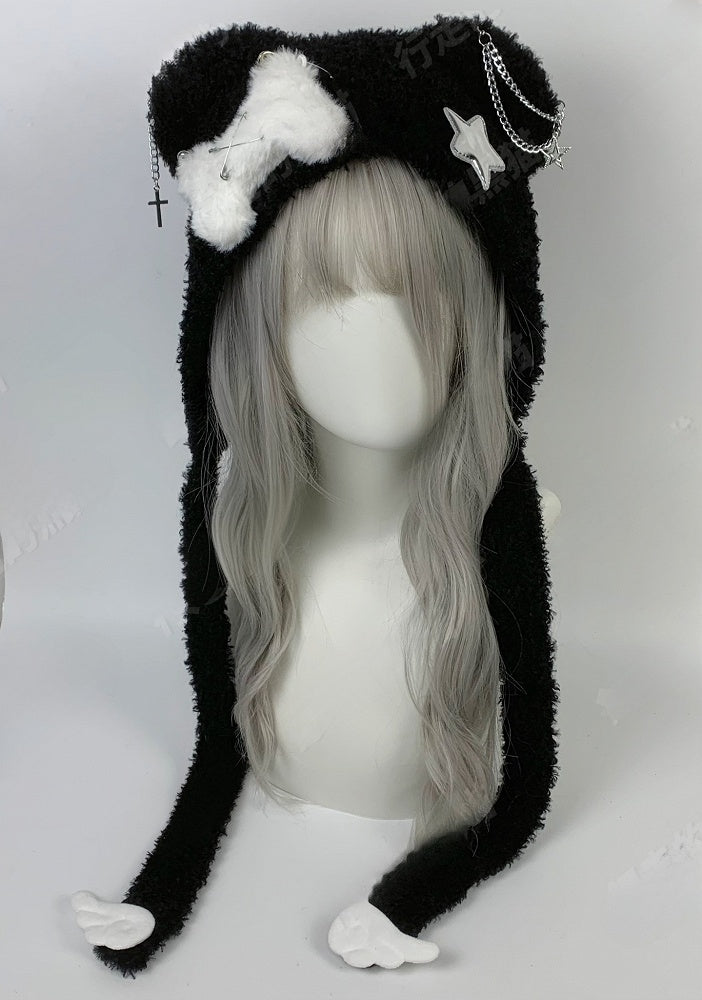 Chapeau en peluche avec oreilles d'ours et ailes croisées noires et blanches