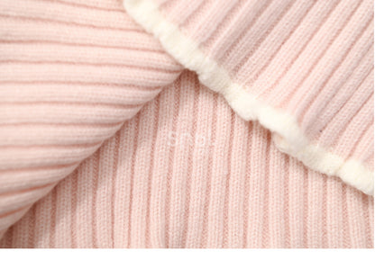 Haut en maille slim à col rond et détails nœud rose