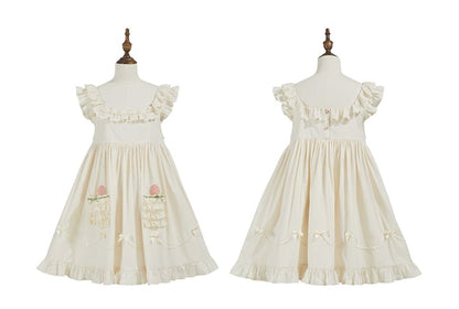 Robe longue beige en coton à taille haute et appliques de fraises