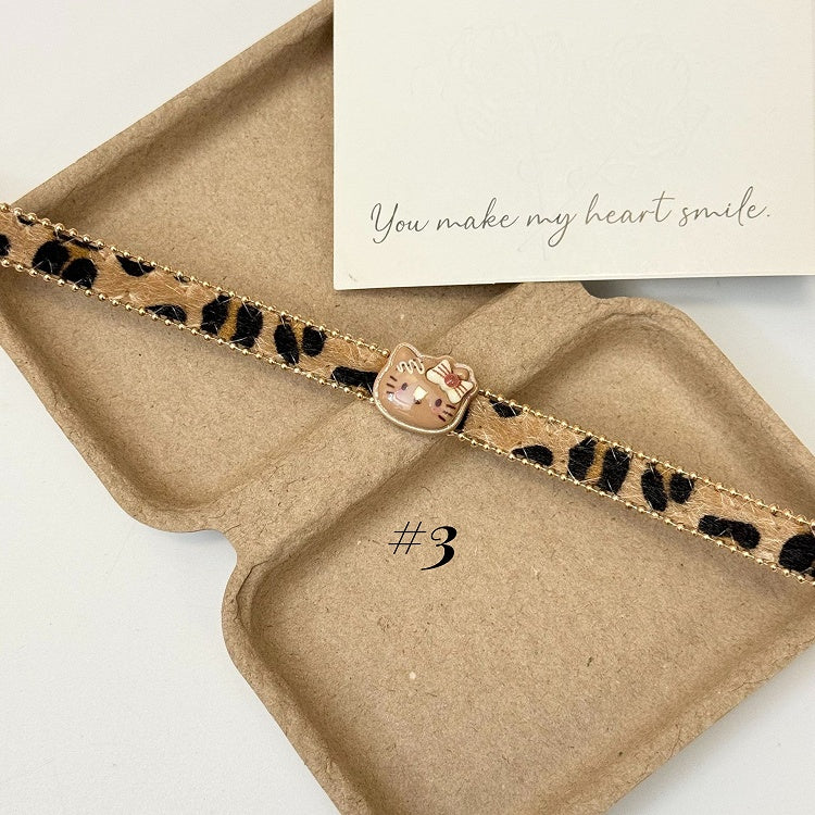 Collier/bague/bracelet/ras-du-cou motif léopard marron