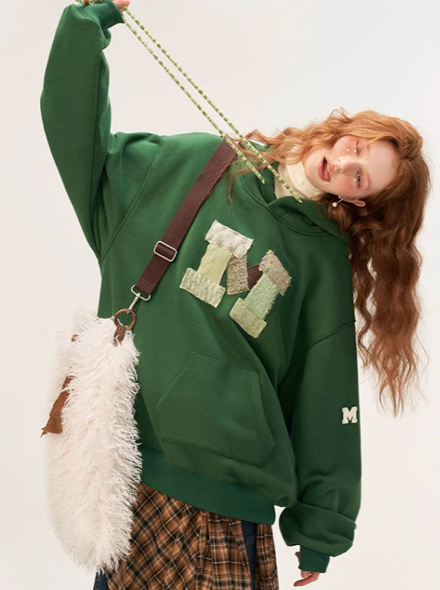 Sweat à capuche ample avec logo en laine