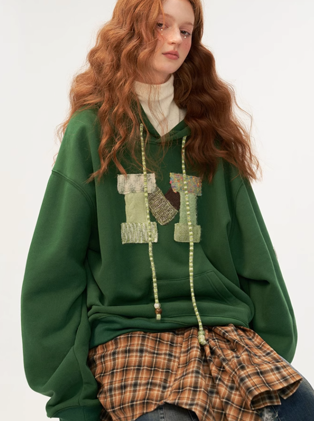 Sweat à capuche ample avec logo en laine
