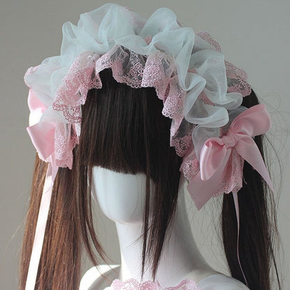Bandeau à cheveux avec nœud papillon vert et rose et bordure en dentelle