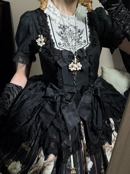 Robe noire à manches courtes style gothique lolita à imprimé poupée Lily et Puppet
