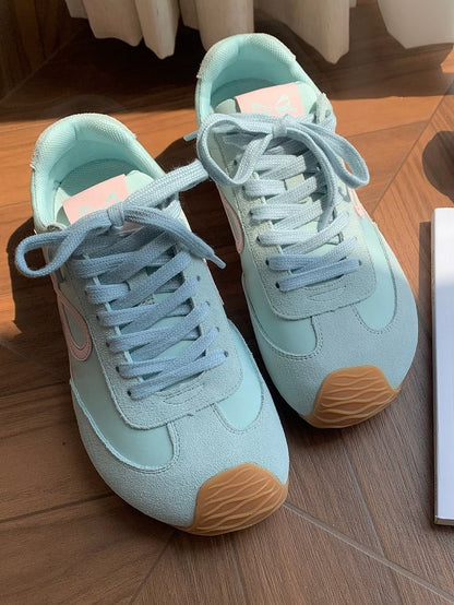 Grüne Schnürschuhe mit Schleife vorne