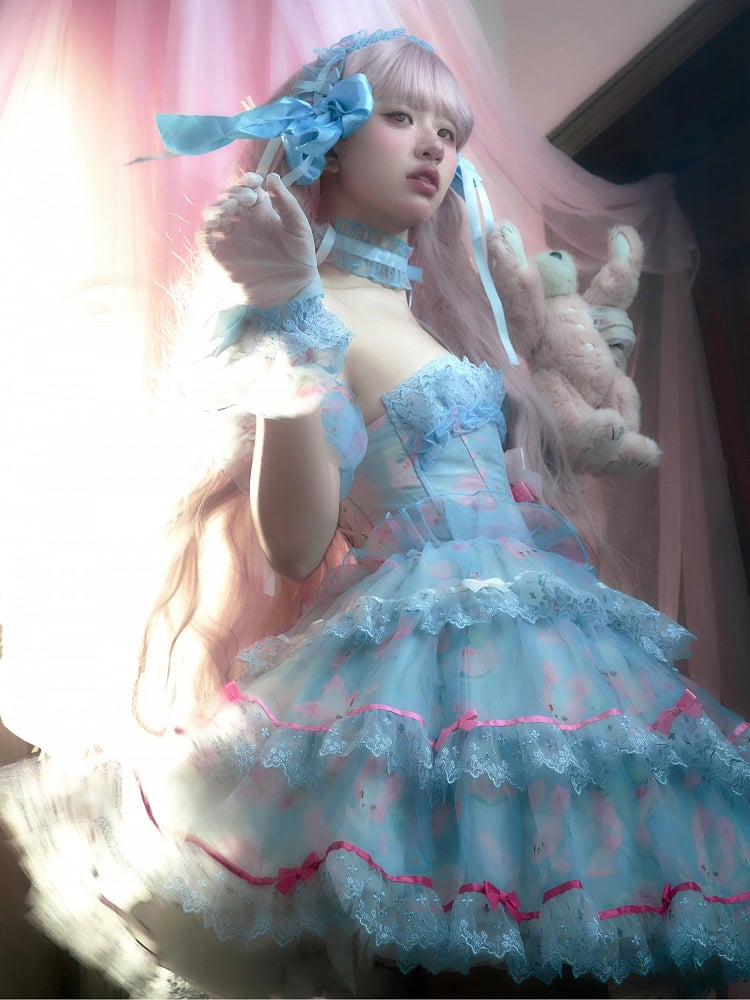 Robe bleue à armatures avec jupe à volants décorée de nœuds en satin et de lapin mignon