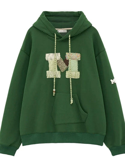 Sweat à capuche ample avec logo en laine