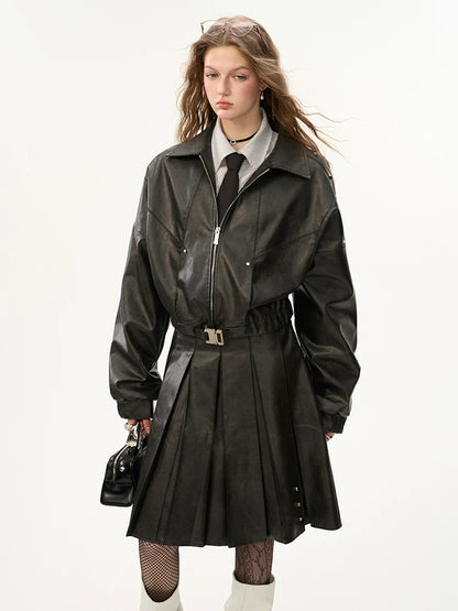 Veste en cuir mode endommagée + jupe moyenne + manteau en cuir avec ceinture