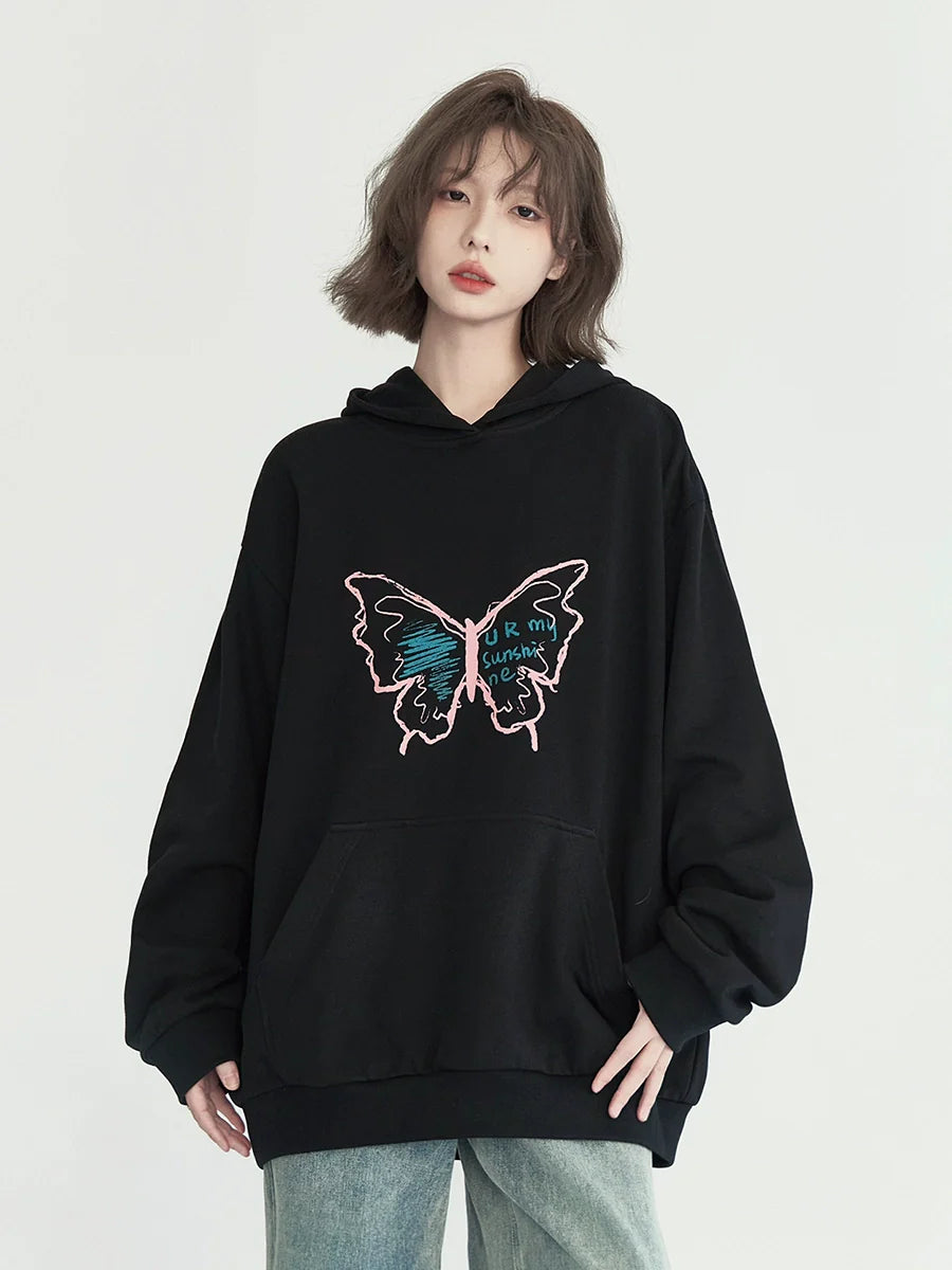 Sweat à capuche ample à motif papillon graphique
