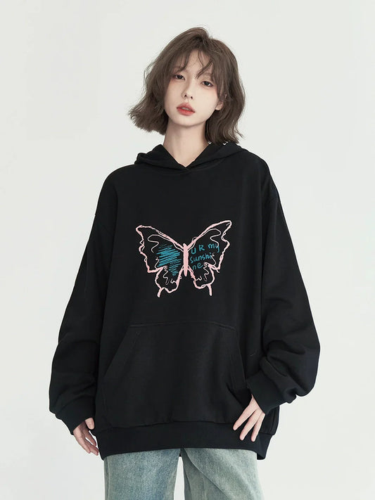 Sweat à capuche ample à motif papillon graphique