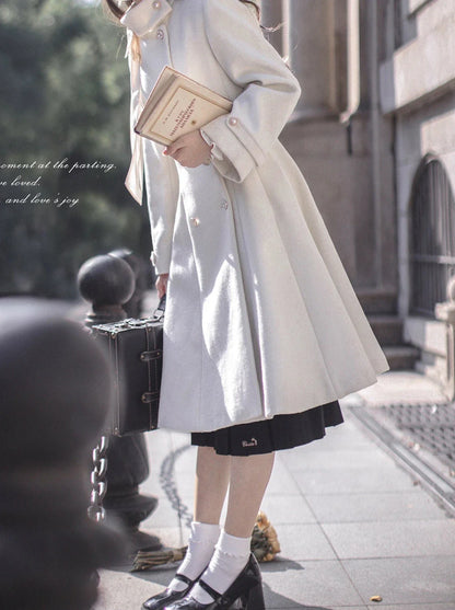 Manteau rétro élégant à double ruban et col boutonné en laine