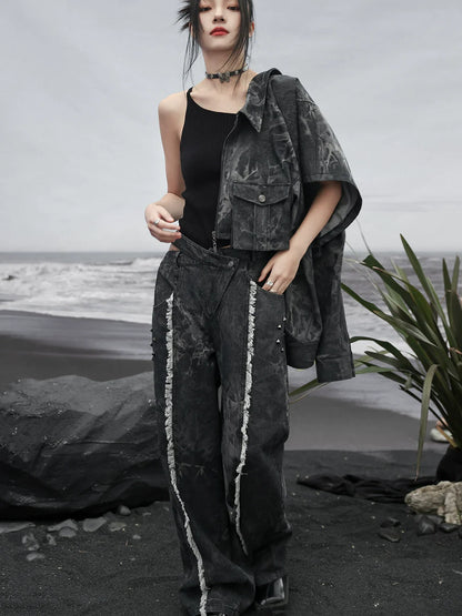 Jean ample à franges et taille large découpée en denim foncé