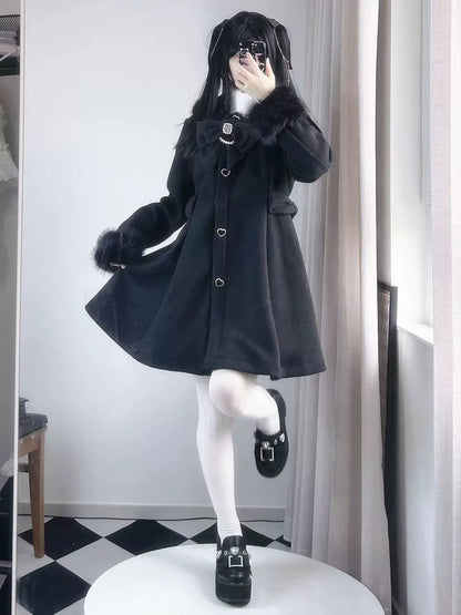 Manteau en fourrure noire pour petit lapin