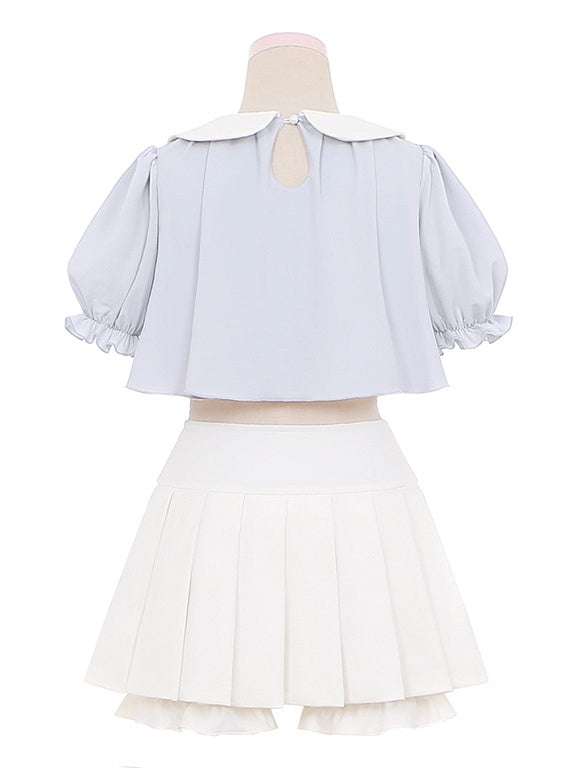 Ensemble haut col Claudine brodé bleu et jupe plissée blanche