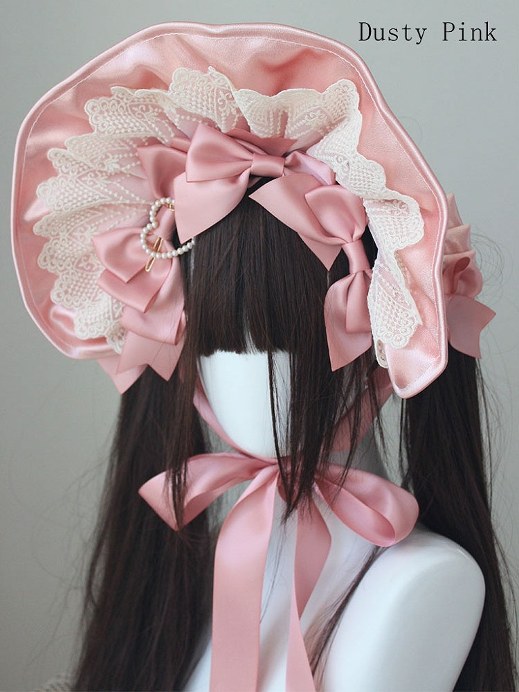Bonnet à bordure en dentelle et nœud décoratif orné de perles