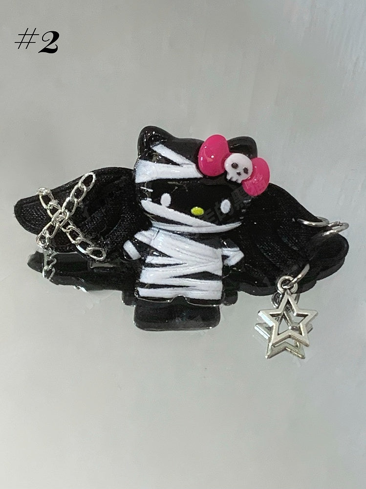 Pinces à cheveux Guro Kawaii Mummy Kitty noires/blanches