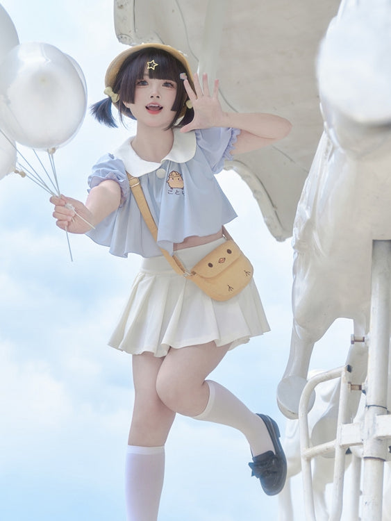 Ensemble haut col Claudine brodé bleu et jupe plissée blanche
