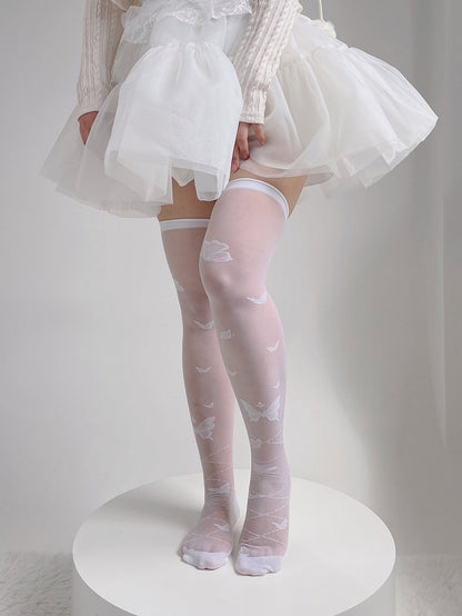 Bas blancs semi-transparents style Lolita papillon au-dessus du genou