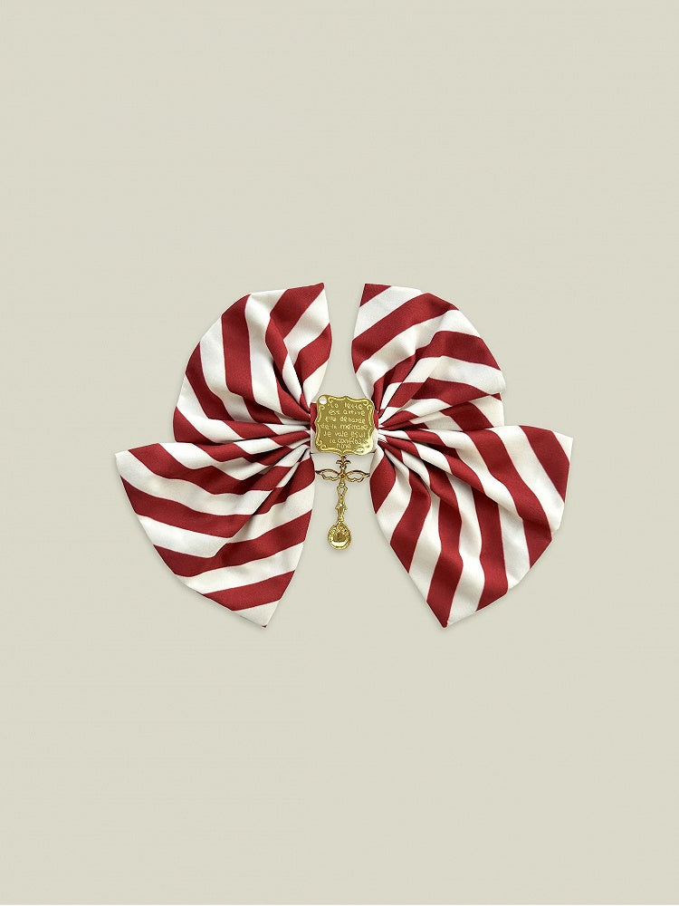 Barrette à cheveux à nœud rayé rouge