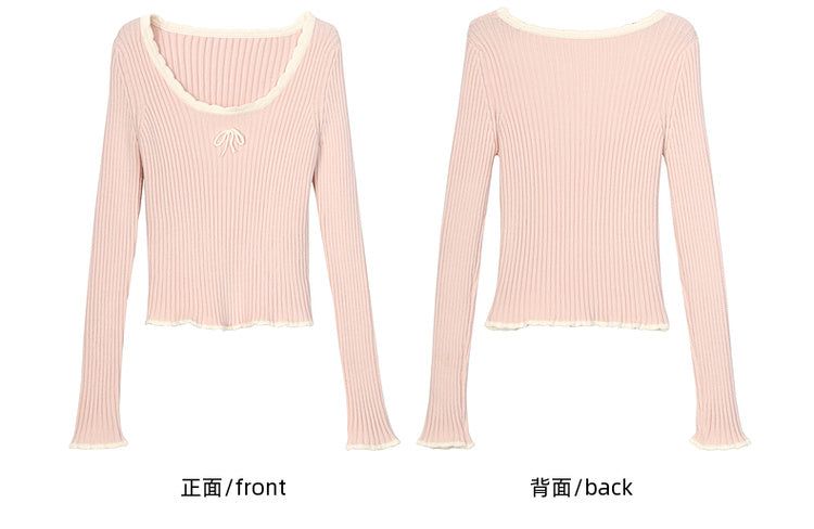 Haut en maille slim à col rond et détails nœud rose