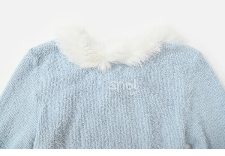 Haut à manches longues et col en peluche bleu avec détails nœud
