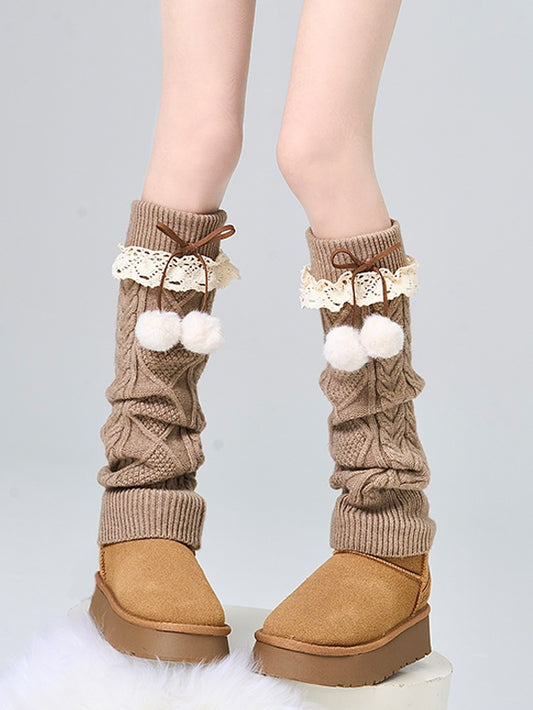 Jambières tricotées à nœud et bordure en dentelle camel avec pompons