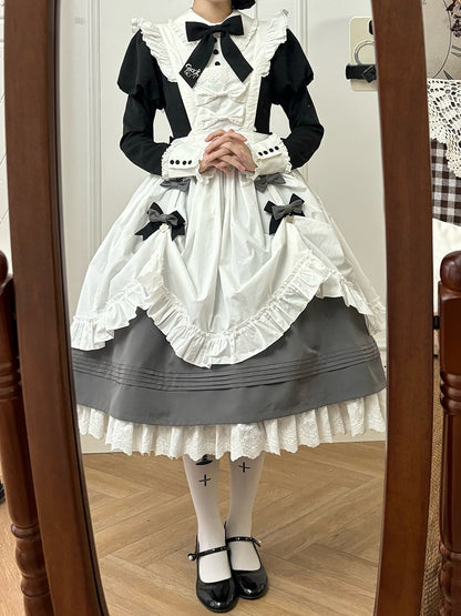 Pince à robe avec nœud papillon noir et gris