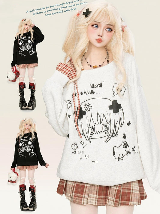 Haut Yami Kawaii noir/blanc à encolure asymétrique et poignets à carreaux