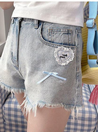 Vintage Denim Shorts Blau Roh Saum Herz Akzent Licht