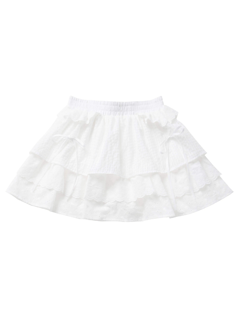 Ensemble haut en dentelle blanc et jupe fleurie rose