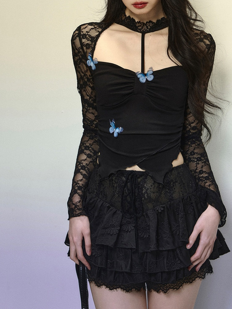 Schwarzes Neckholder-Top mit asymmetrischem Saum und verziertem Ausschnitt