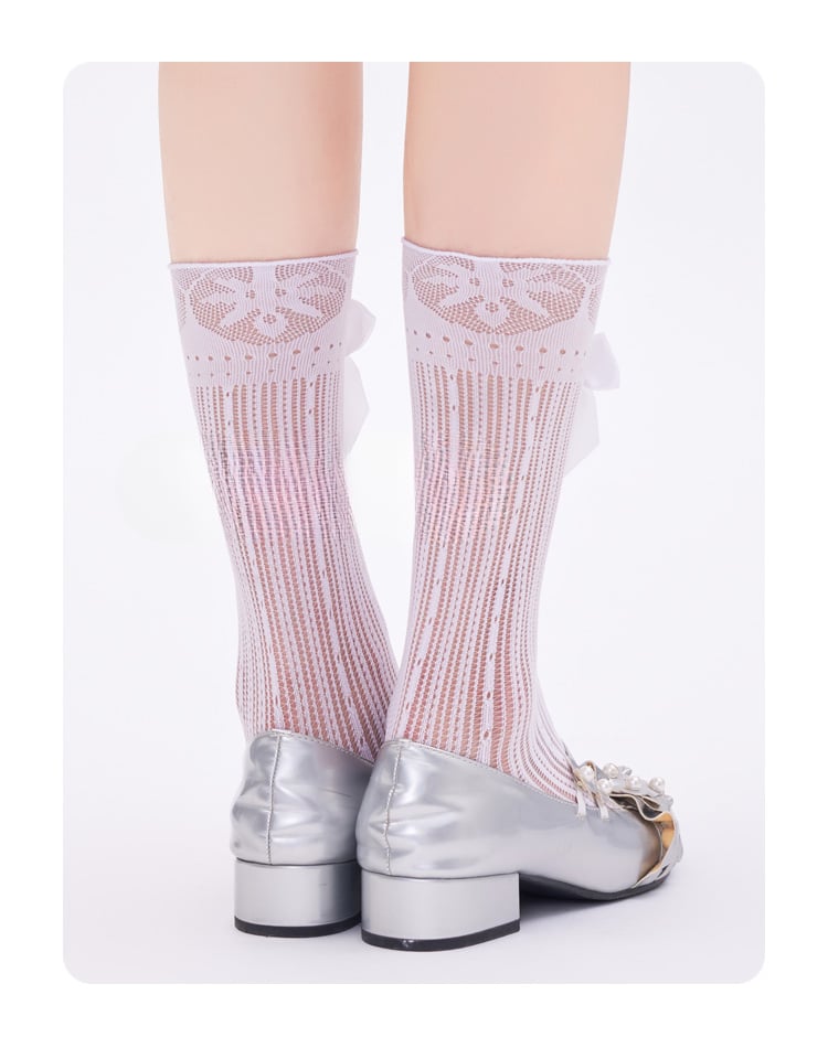 Schwarz/weiße, halbtransparente Wadensocken mit Schleife und Spitze