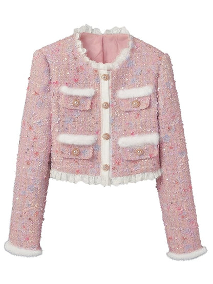 Veste courte en tweed rose avec détails floraux, perles et paillettes