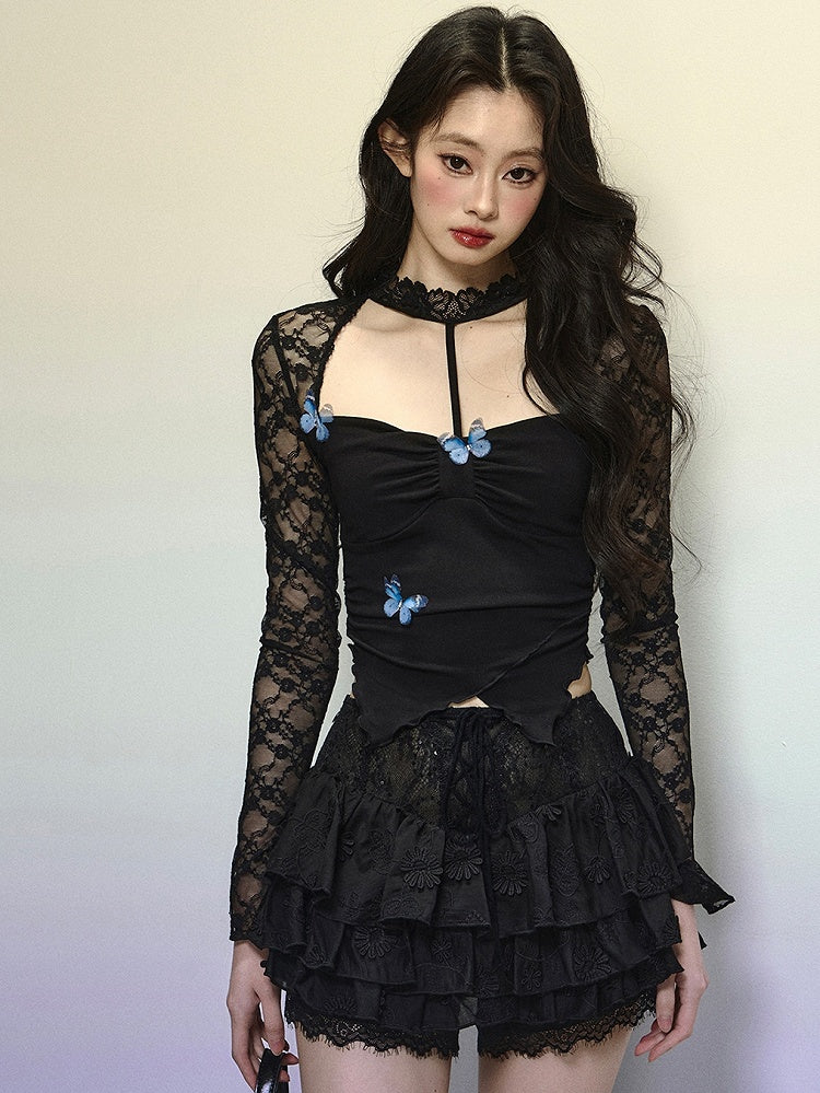 Schwarzes Neckholder-Top mit asymmetrischem Saum und verziertem Ausschnitt