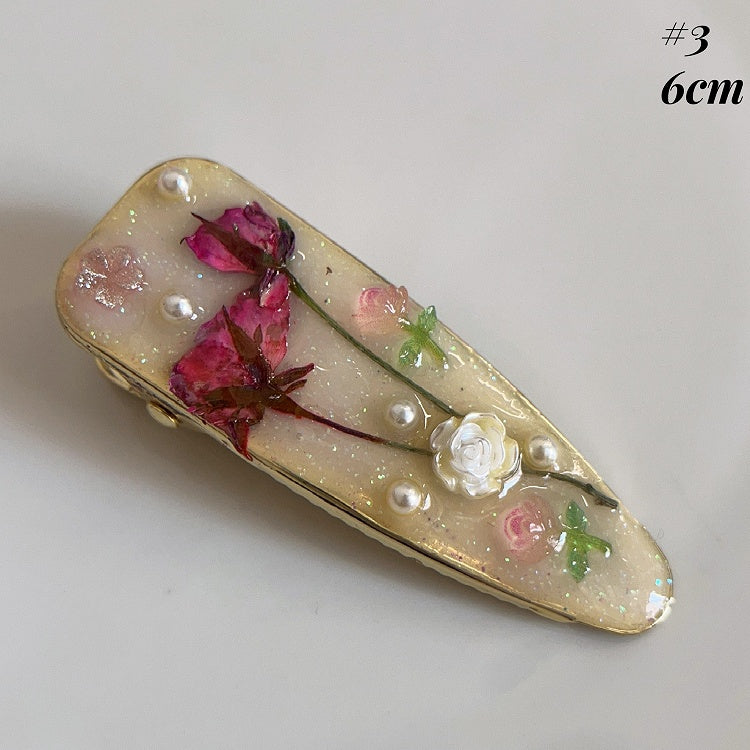 油絵風の花柄ヘアクリップ