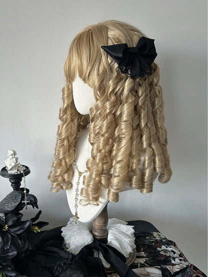 Barrettes à cheveux noires avec nœud papillon