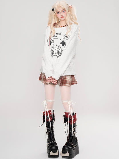 Haut Yami Kawaii noir/blanc à encolure asymétrique et poignets à carreaux