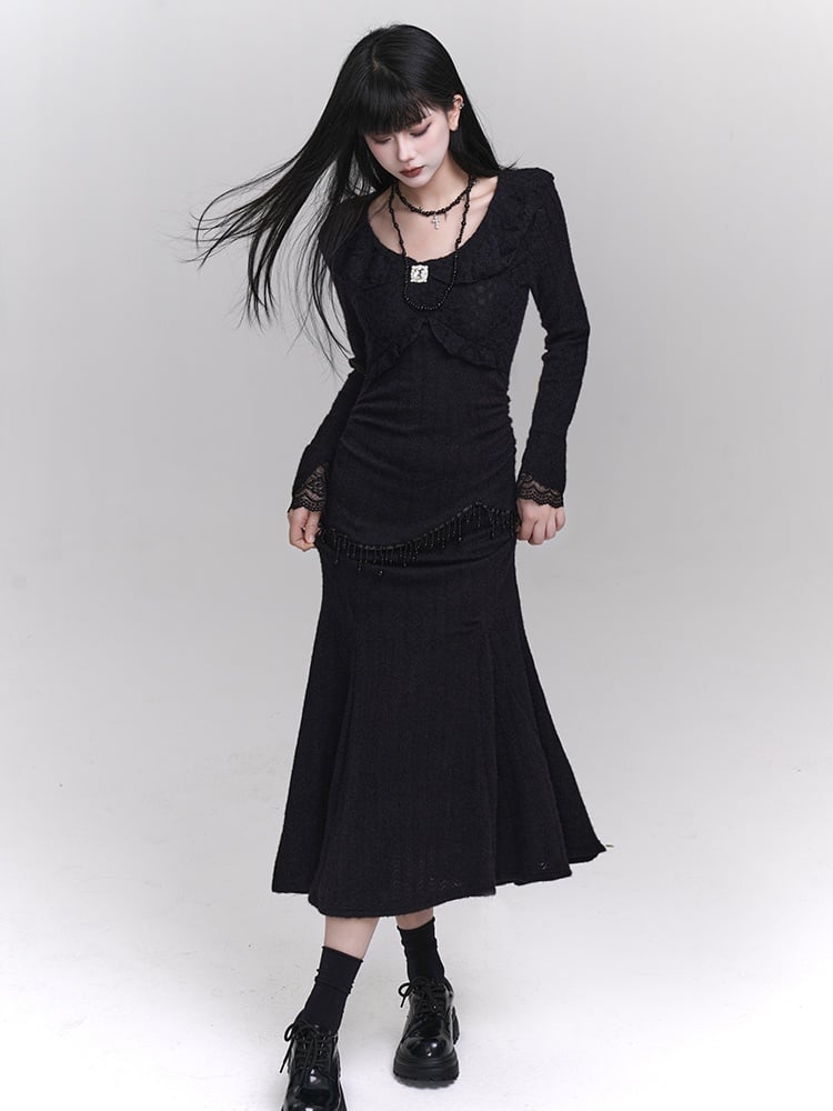 Robe sirène noire ajustée à col rond et détails en perles