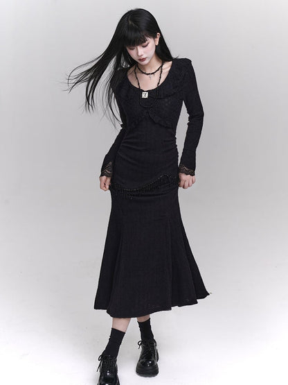 Robe sirène noire ajustée à col rond et détails en perles