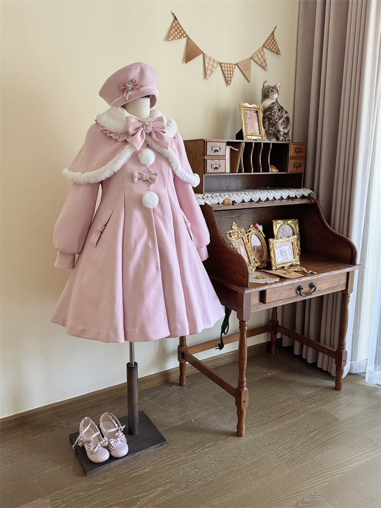 Manteau long à col en peluche rose avec nœud et cape amovible