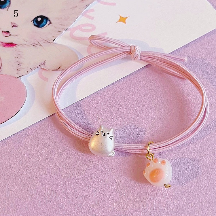 Options Kitty's Tie Paw Charm 9 Hair