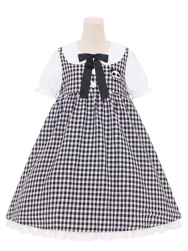 Robe à carreaux noire et blanche à col Peter Pan et manches courtes bouffantes